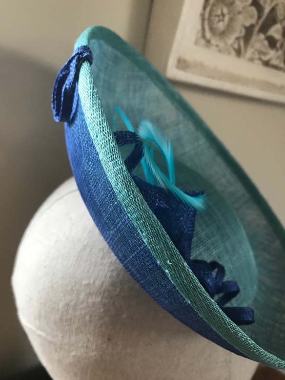 aqua and royal sinamay saucer perching hat. Isabella Josie